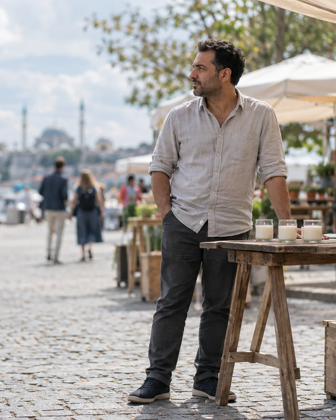 A candle maker tests three prototypes at a street fair table and watches how people react.